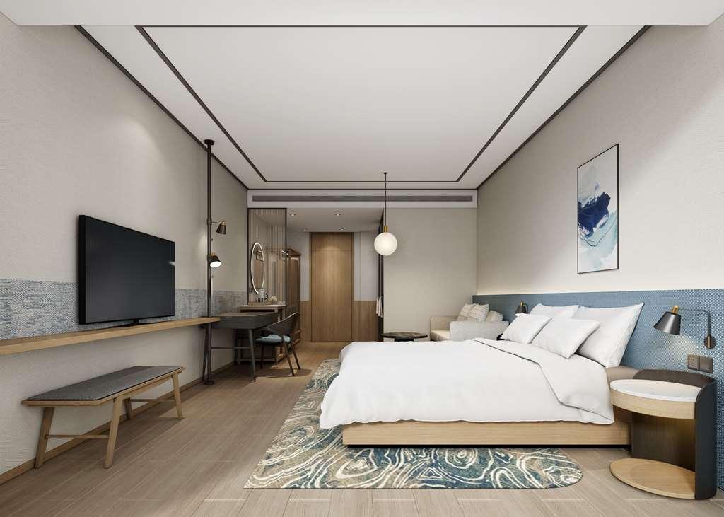 Hilton Garden Inn Shenzhen Airport,Enjoy 24-Hour One Way Free Delivery From Hotel To Shenzhen Baoan Airport On The Hour Rum bild