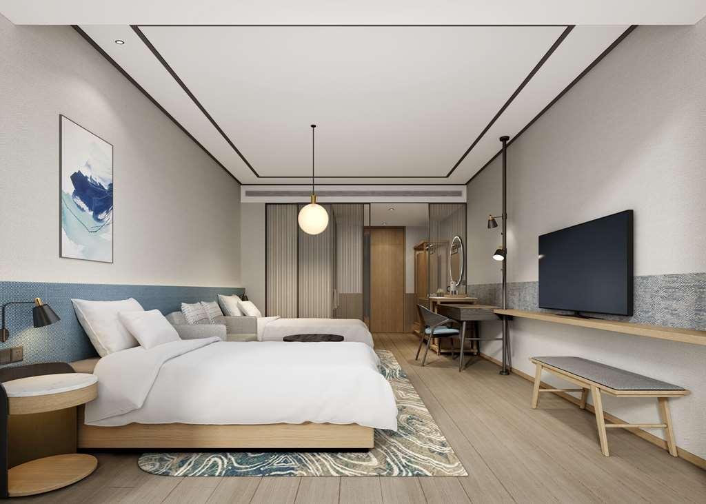 Hilton Garden Inn Shenzhen Airport,Enjoy 24-Hour One Way Free Delivery From Hotel To Shenzhen Baoan Airport On The Hour Rum bild